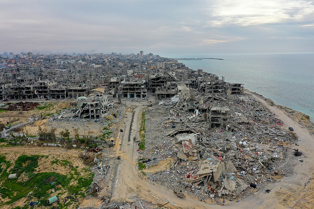 Aerial view of destroyed buildings along the coast in Beach refugee camp, Gaza Strip