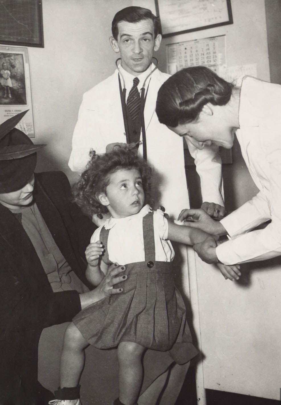 Historical public vaccination clinic scene (illustrative of immunization campaigns)