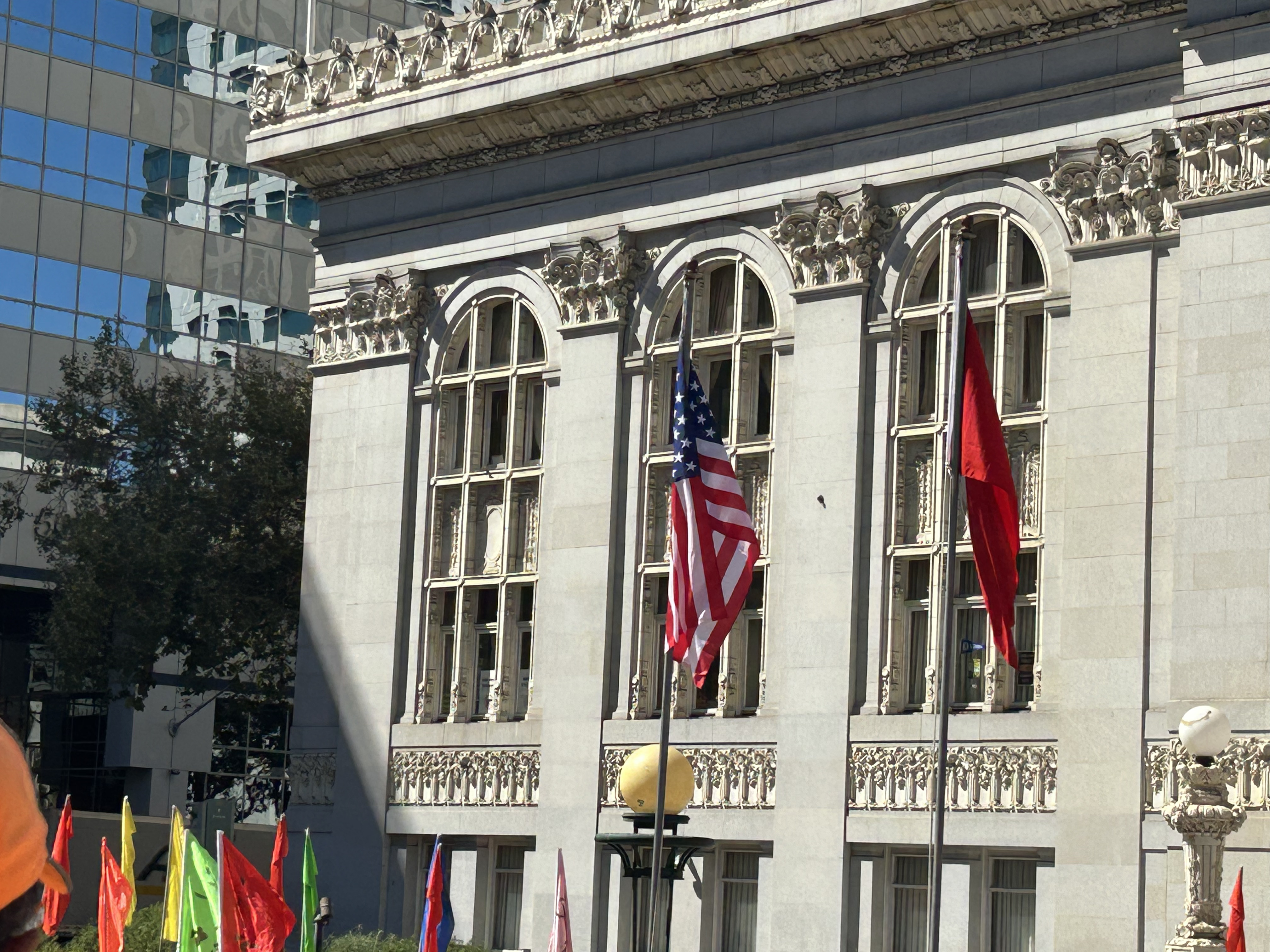 United States and People’s Republic of China flags raised together at Oakland City Hall (PRC 75th Anniversary)