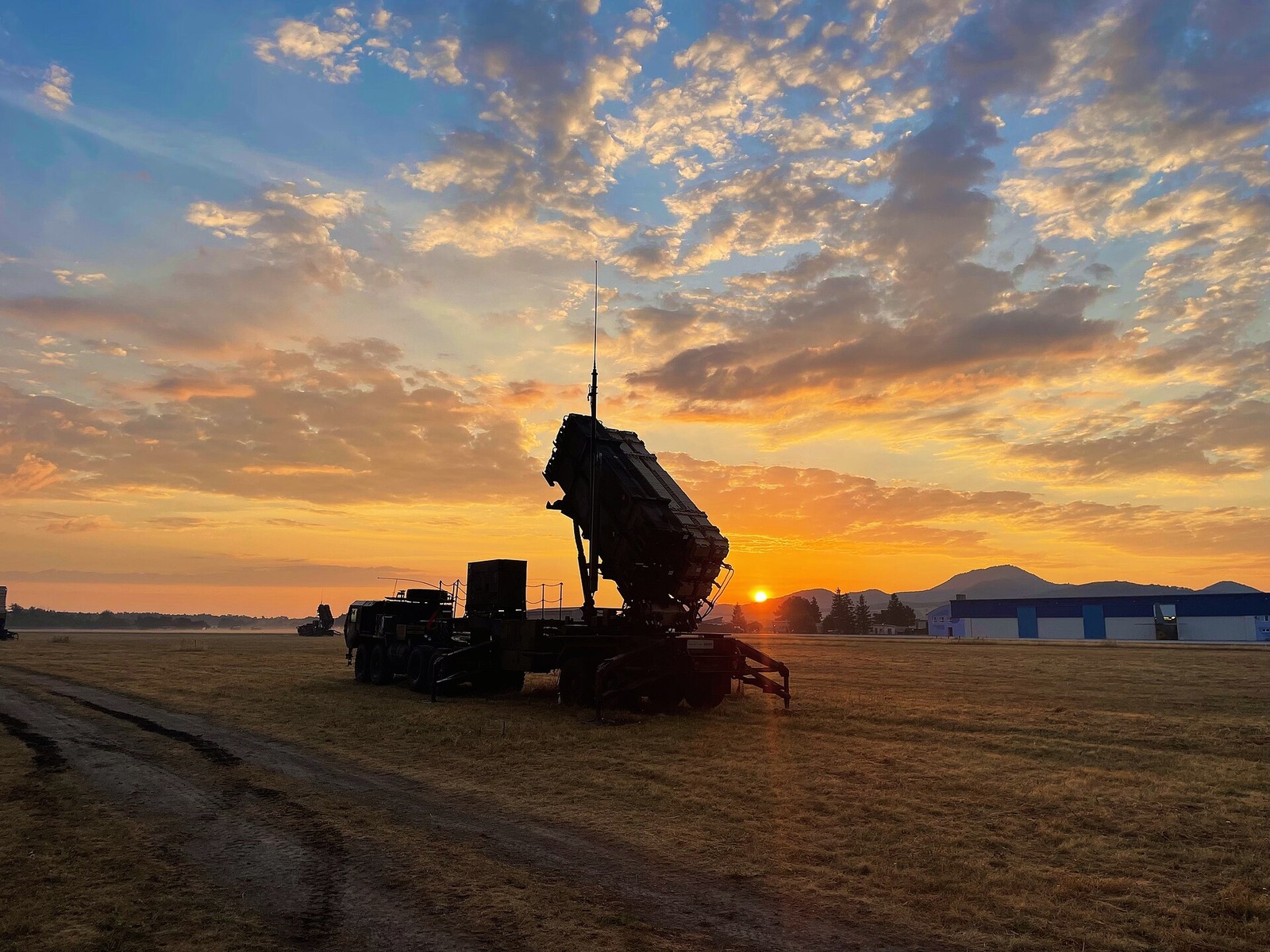 Sun rises over a Patriot missile launcher in Slovakia during NATO air-defense training