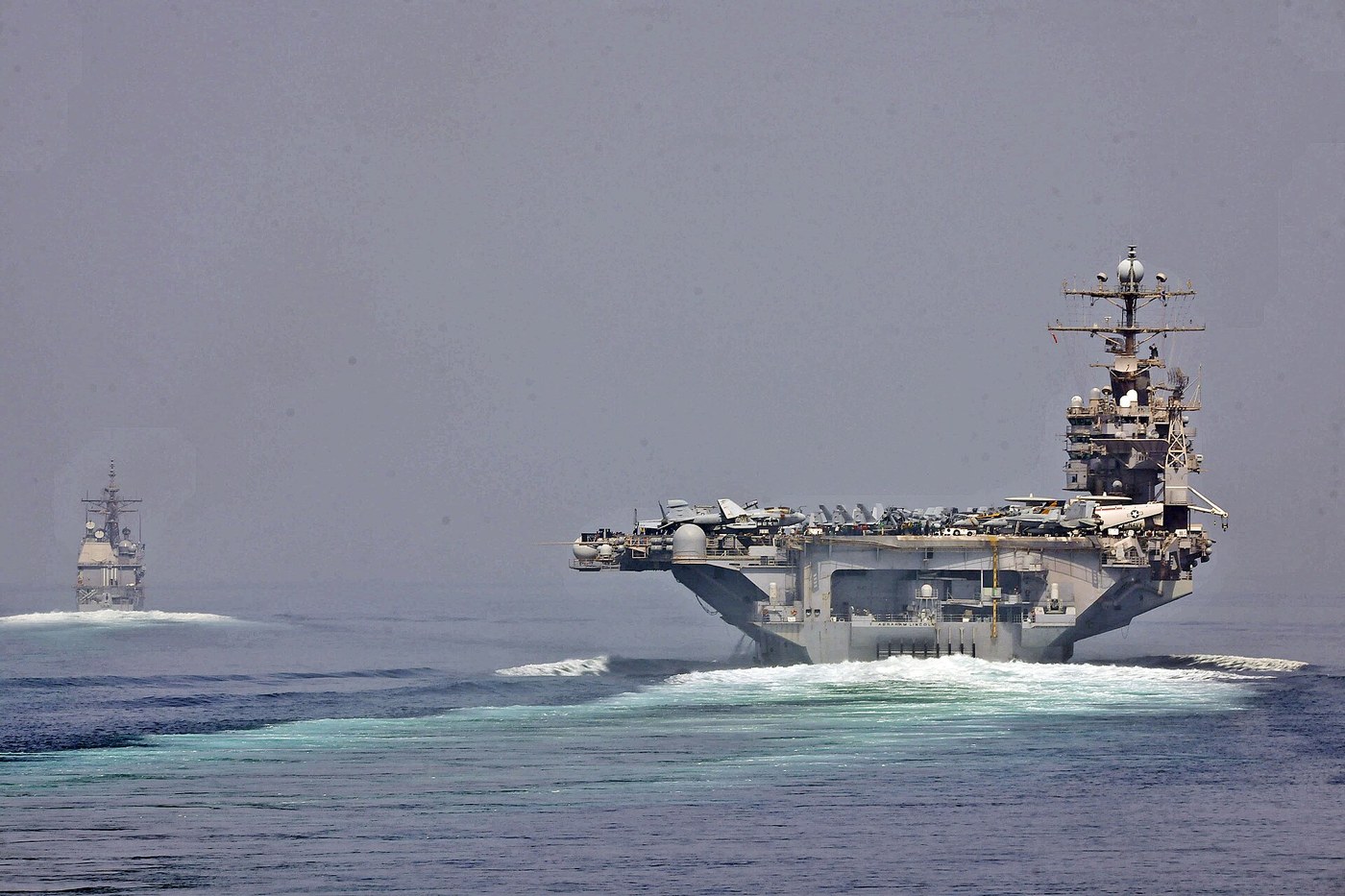 U.S. Navy aircraft carrier USS Abraham Lincoln and escort underway during a Strait of Hormuz transit