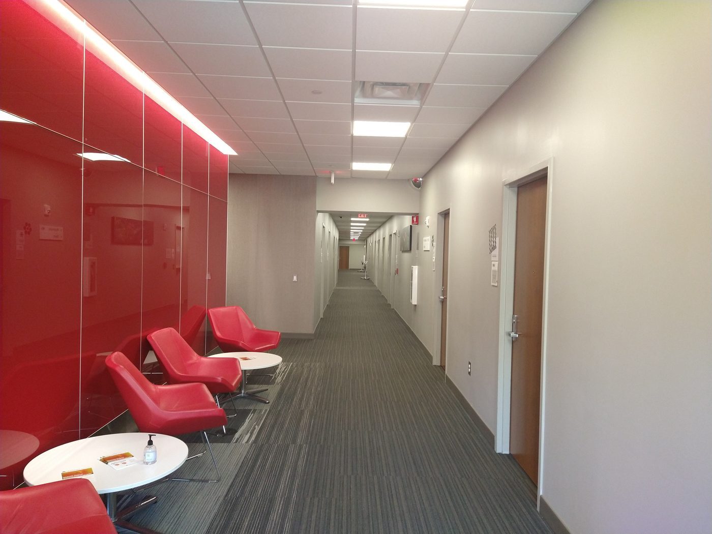 Hospital corridor with computer workstation at a nurses station