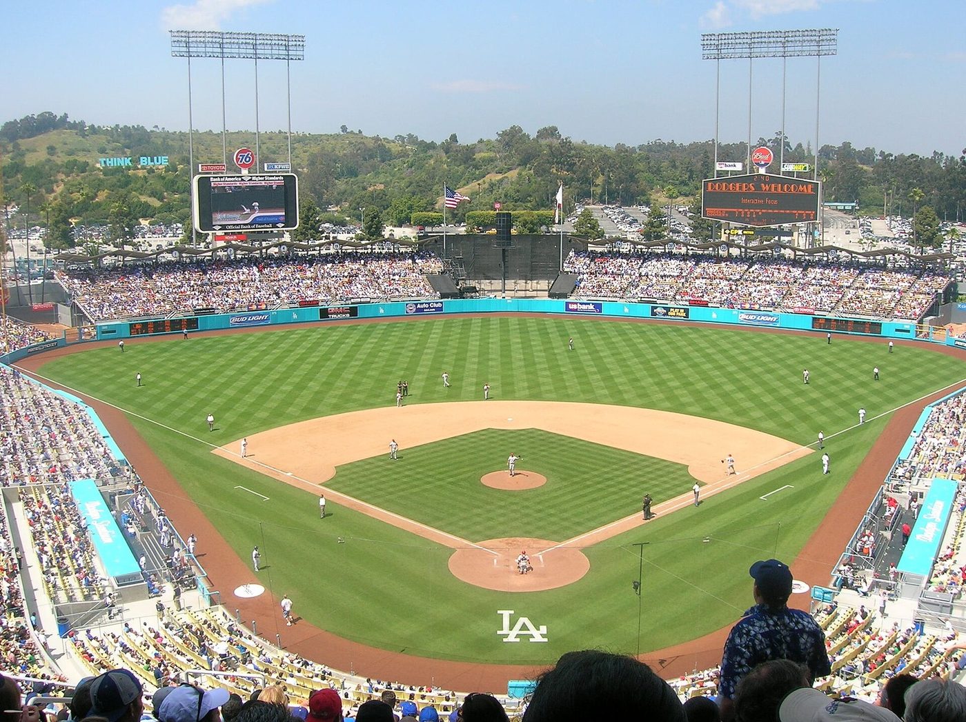 Dodger Stadium field under afternoon sun for playoff baseball