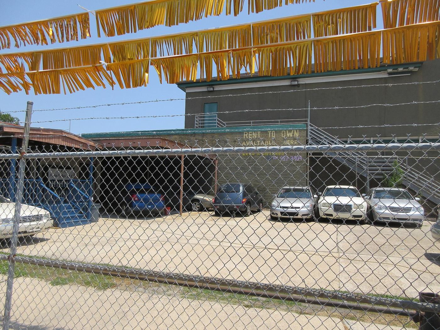 Used cars parked on a dealership lot