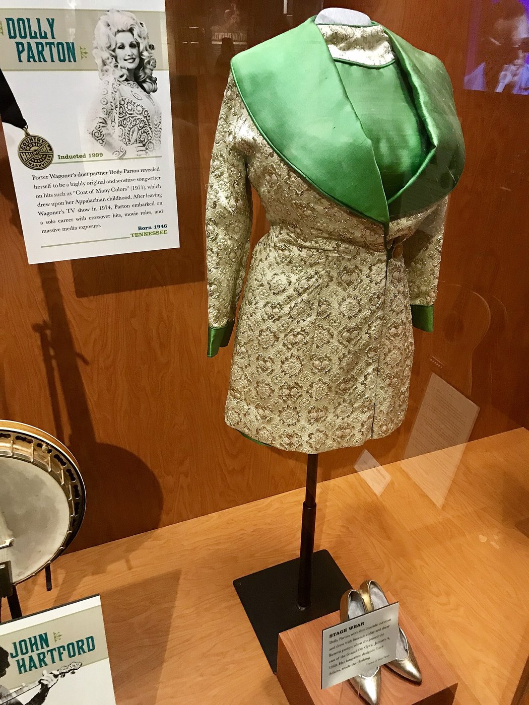 Dolly Parton's stage wear when joined as the cast the Grand Ole Opry in 1969-01-04 - brocade overwear and dress with bro