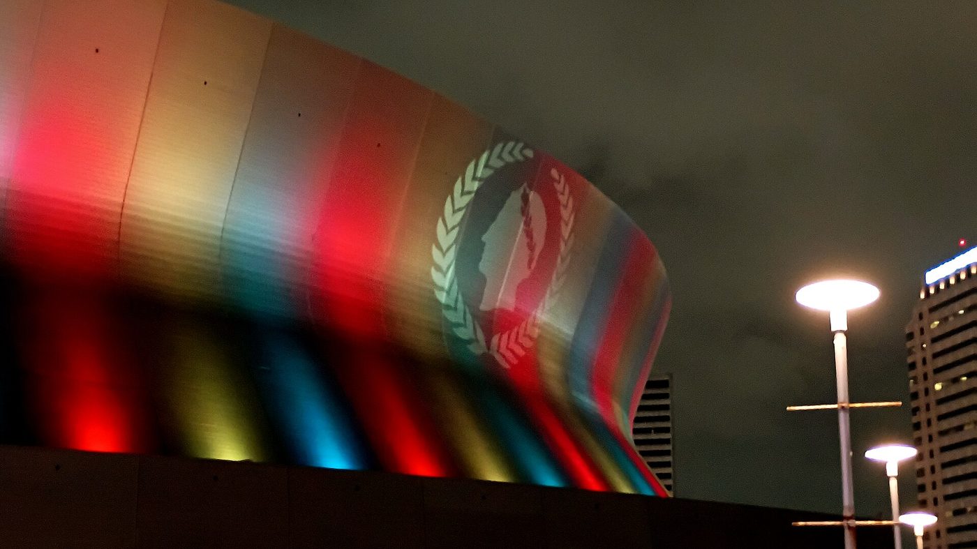 The Caesars Superdome in New Orleans lit up at night