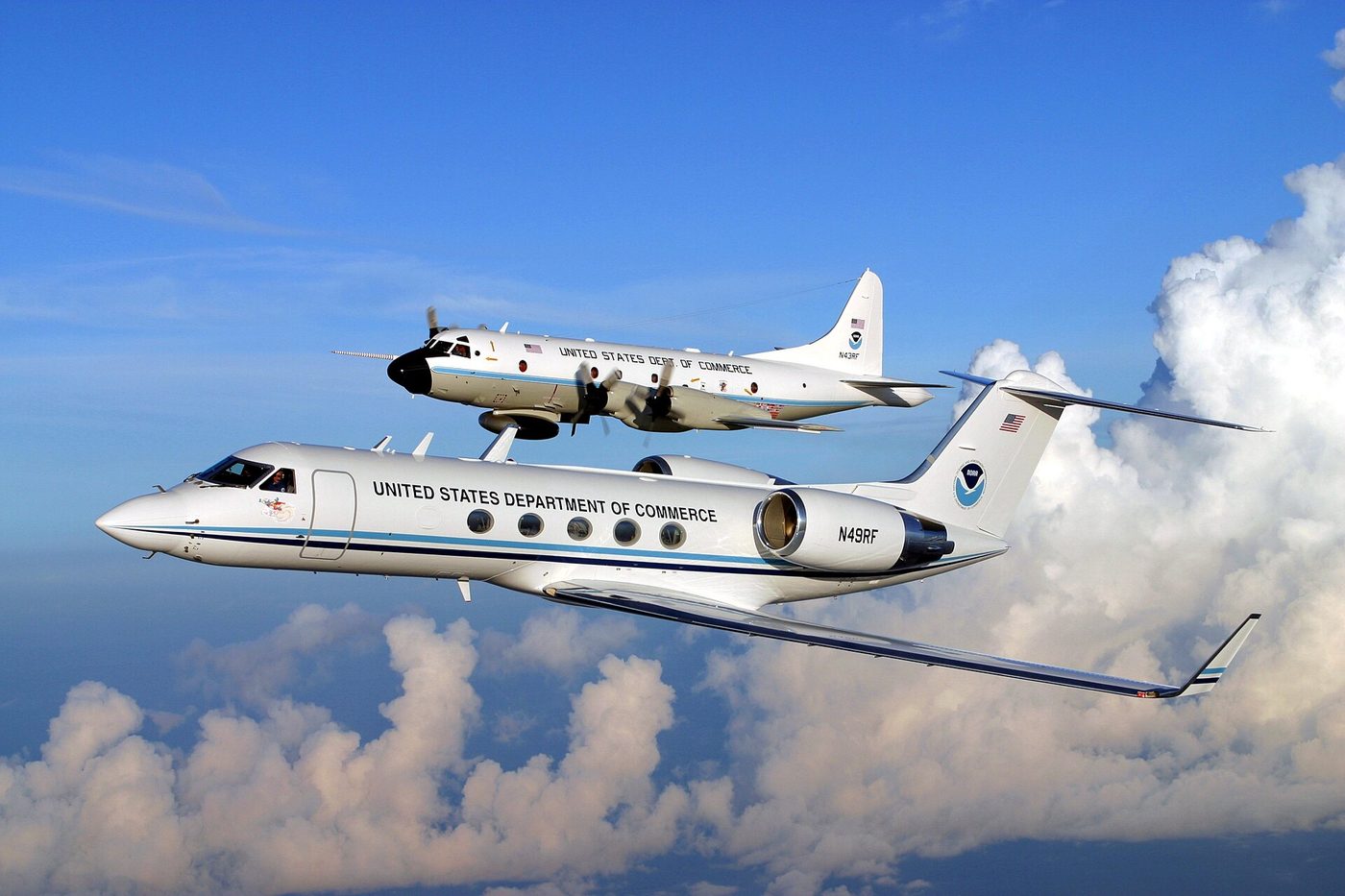 NOAA's Gulfstream IV and WP-3 Hurricane Hunter aircraft parked side by side