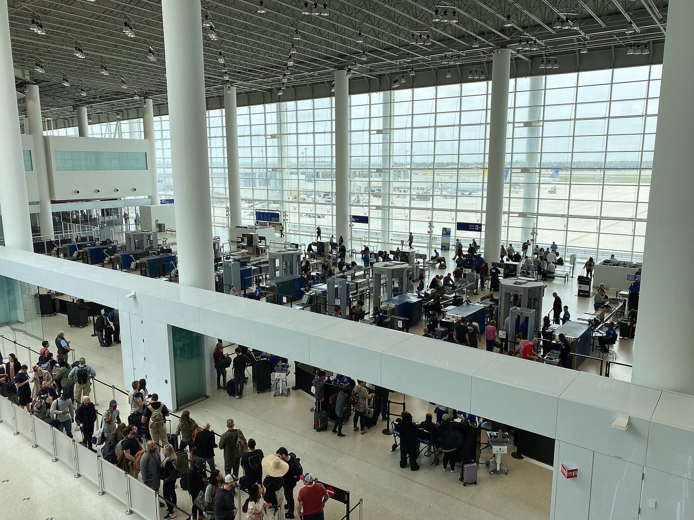 Travelers at a TSA security checkpoint at the New Orleans airport