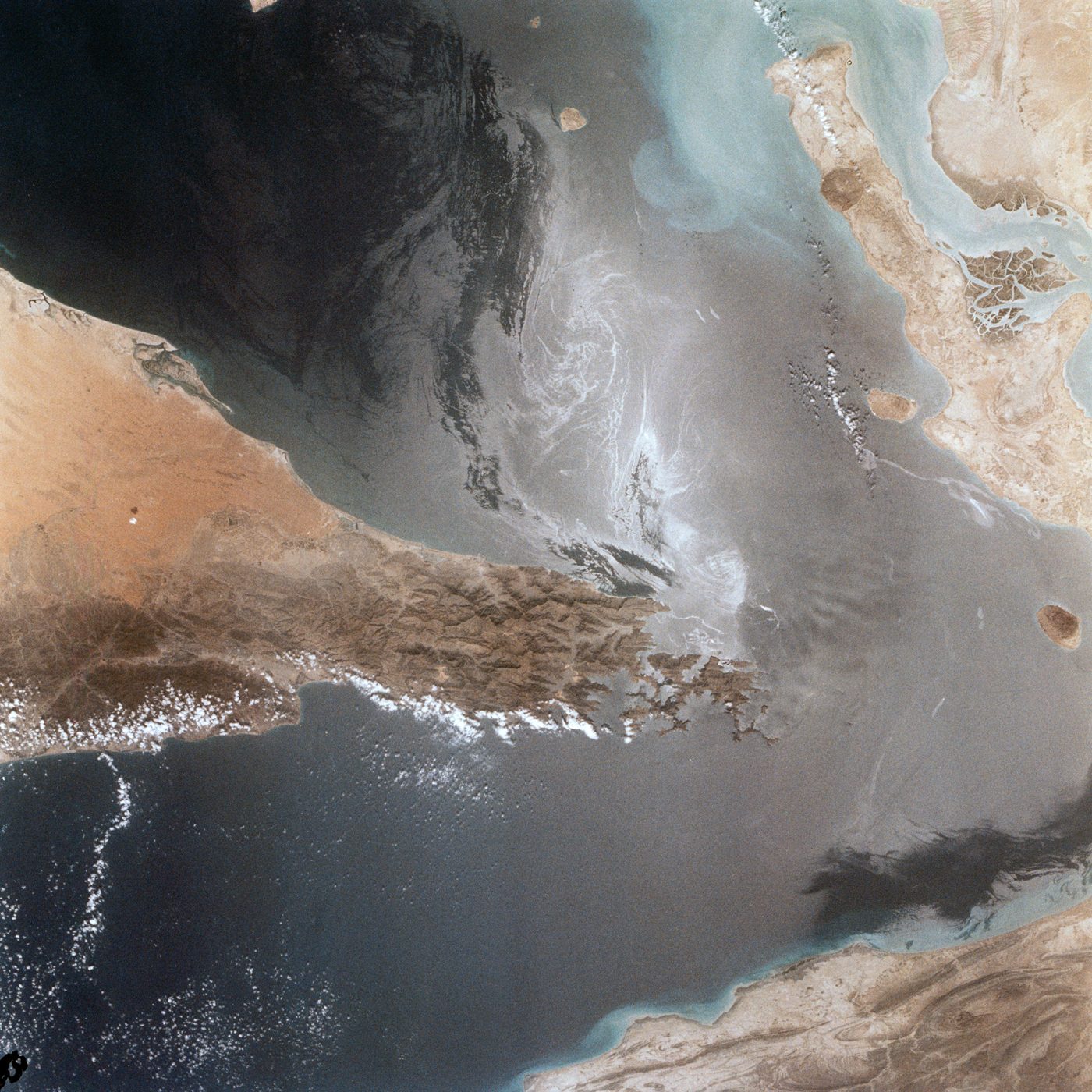 The Strait of Hormuz seen from the space shuttle, with Oman, the United Arab Emirates and Iran on its shores