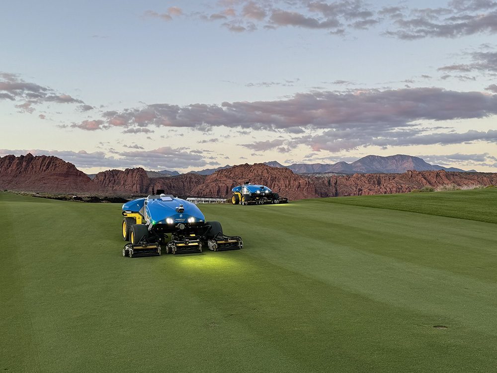 Autonomous electric mowers on a fairway at the Black Desert Resort golf course in Utah