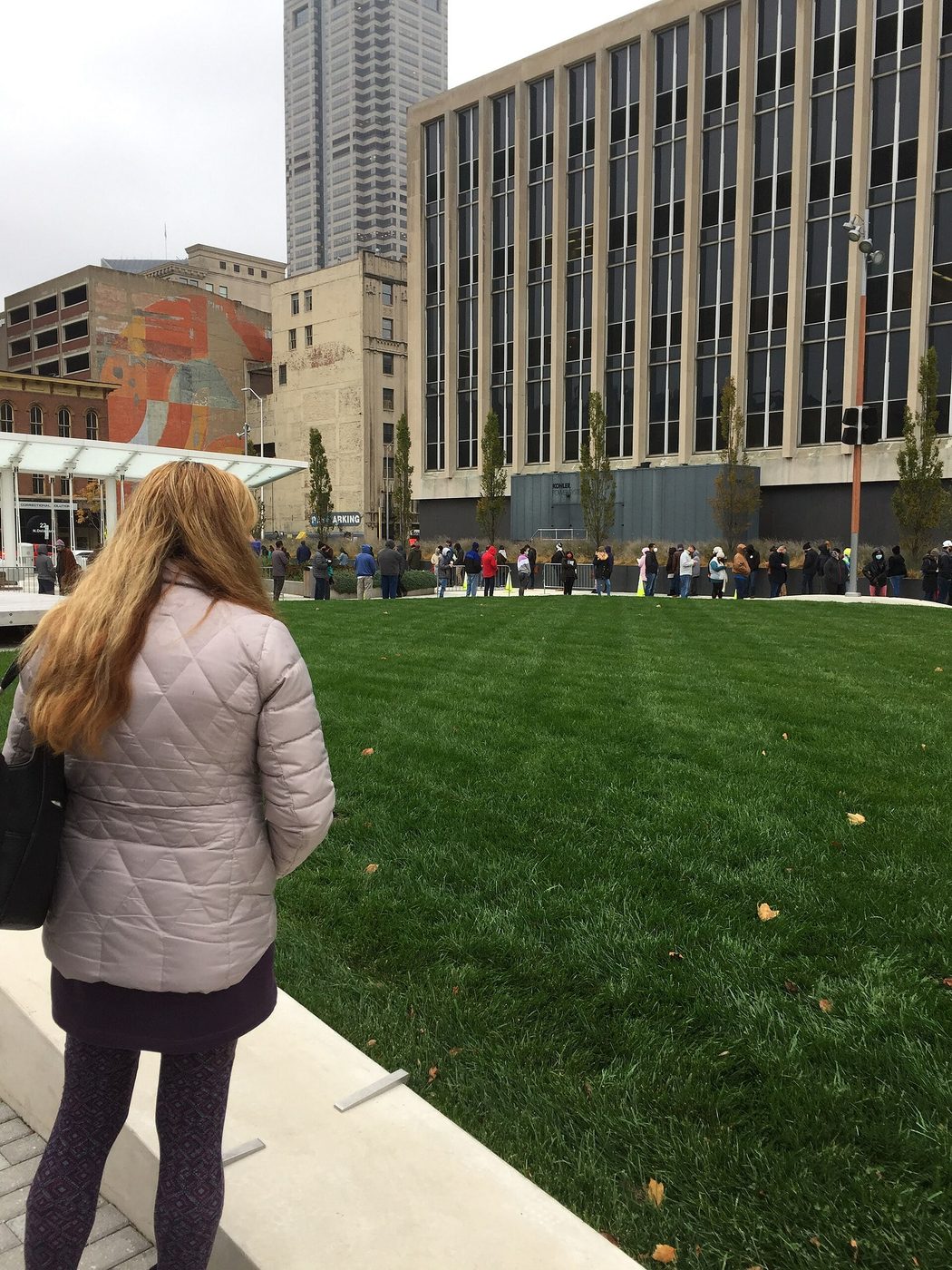 A voter waits in an early-voting line outside the City-County Building in Indianapolis in October 2020
