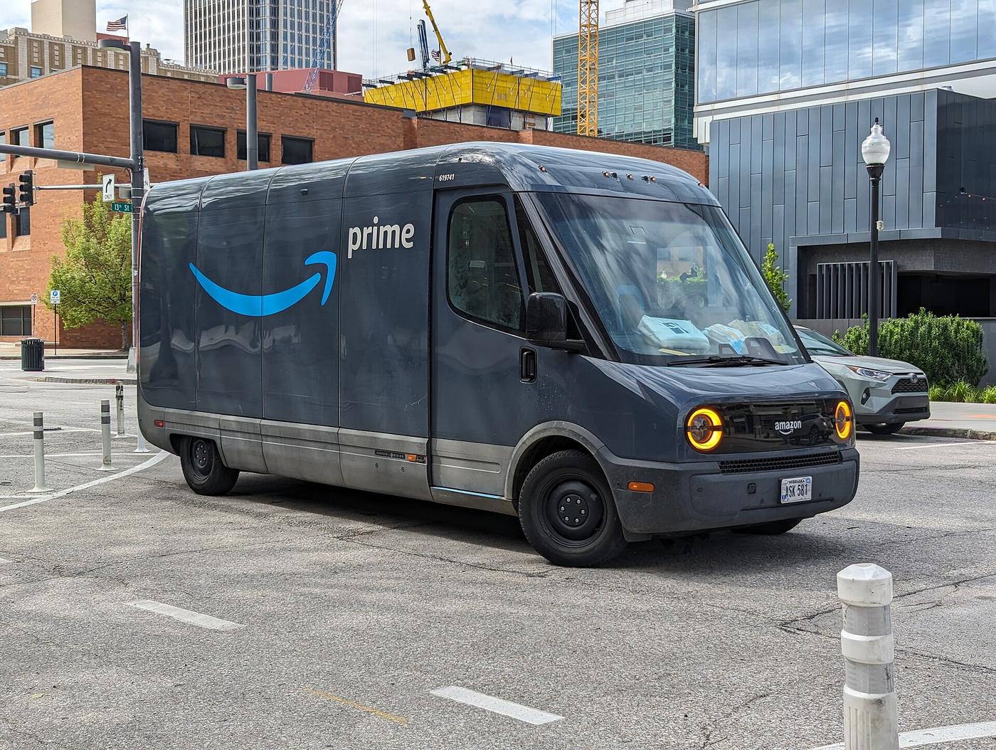 An Amazon-branded Rivian electric delivery van in downtown Omaha, Nebraska