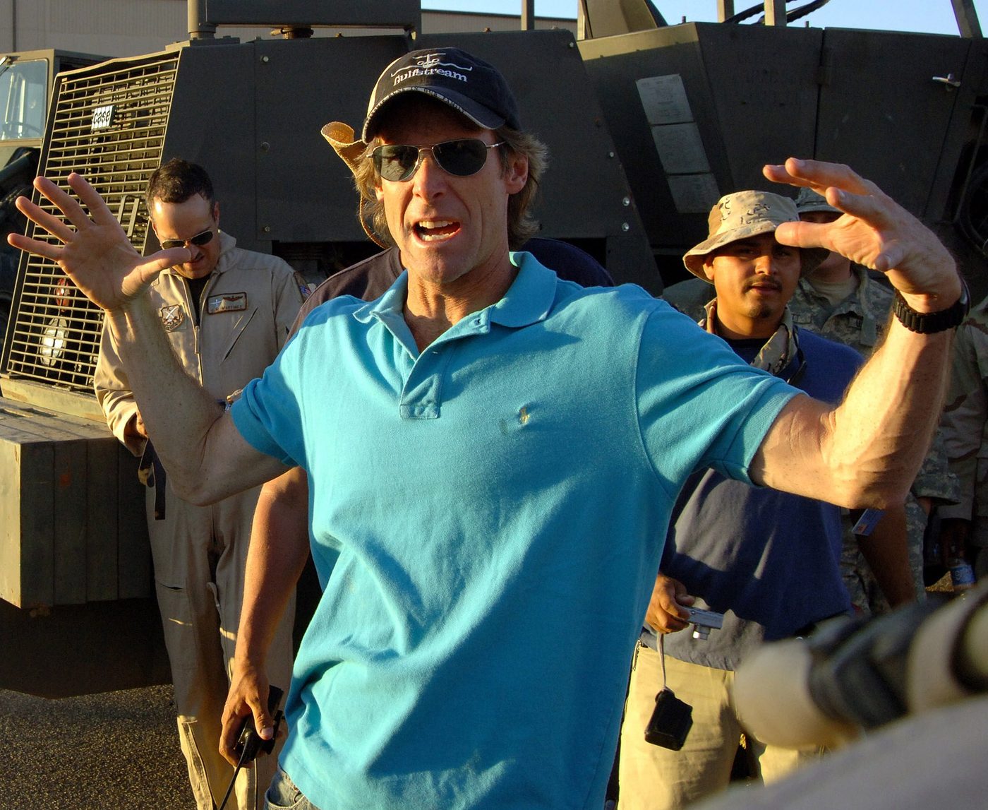 Director Michael Bay works with Airmen serving as extras on the set of 'Transformers' at Holloman Air Force Base in 2006