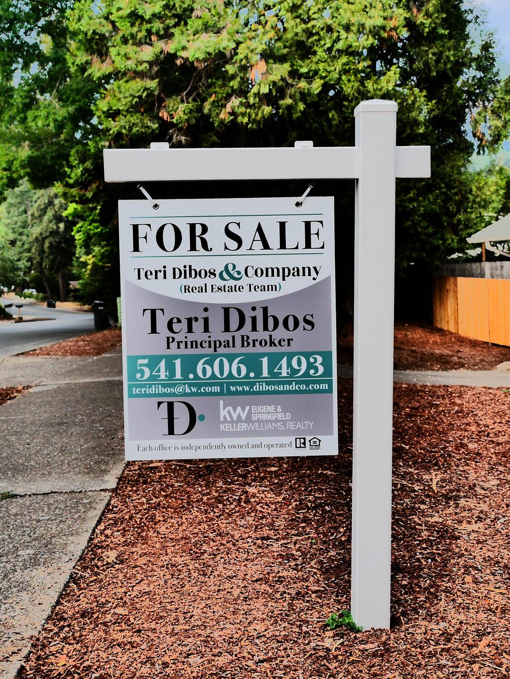 A home-for-sale sign in Eugene, Oregon