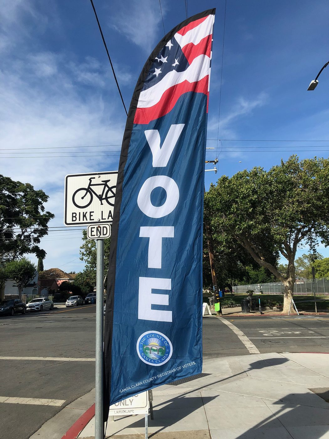 A "Vote" feather flag outside a Santa Clara County vote center at Holy Cross Church in San Jose, California, during the June 2022 primary