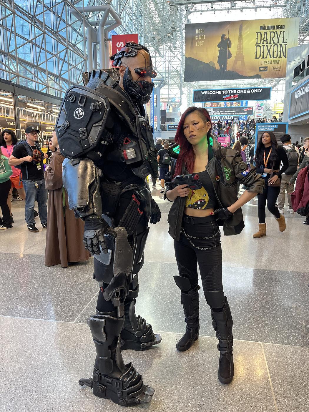 Cosplayers dressed as Adam Smasher and V from the video game Cyberpunk 2077 at New York Comic Con in 2023