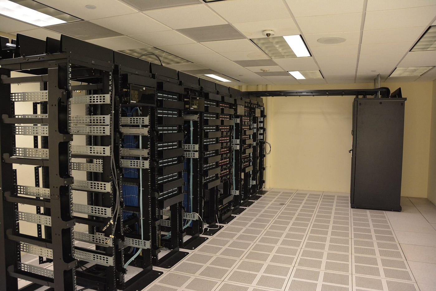 Rows of server racks inside a data center