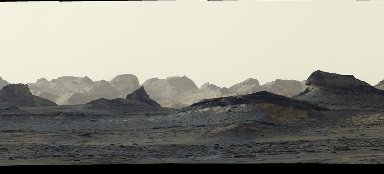 Sunrise lights wind-carved cliffs called yardangs on Mars, in a panorama from NASA's Curiosity rover taken Aug. 11, 2026 (cropped)