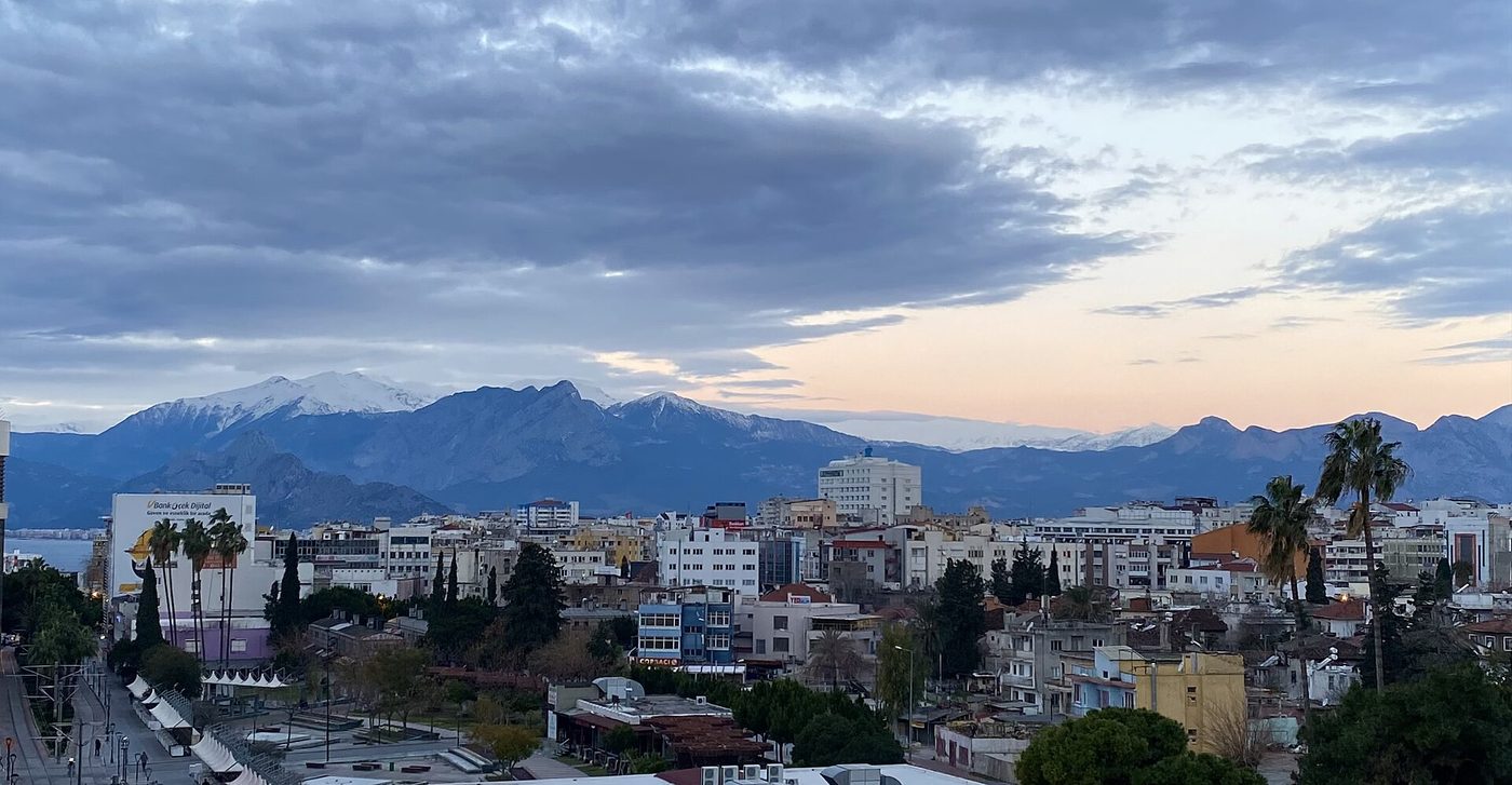 The Antalya, Turkey, skyline with snow-capped mountains behind it in February 2022