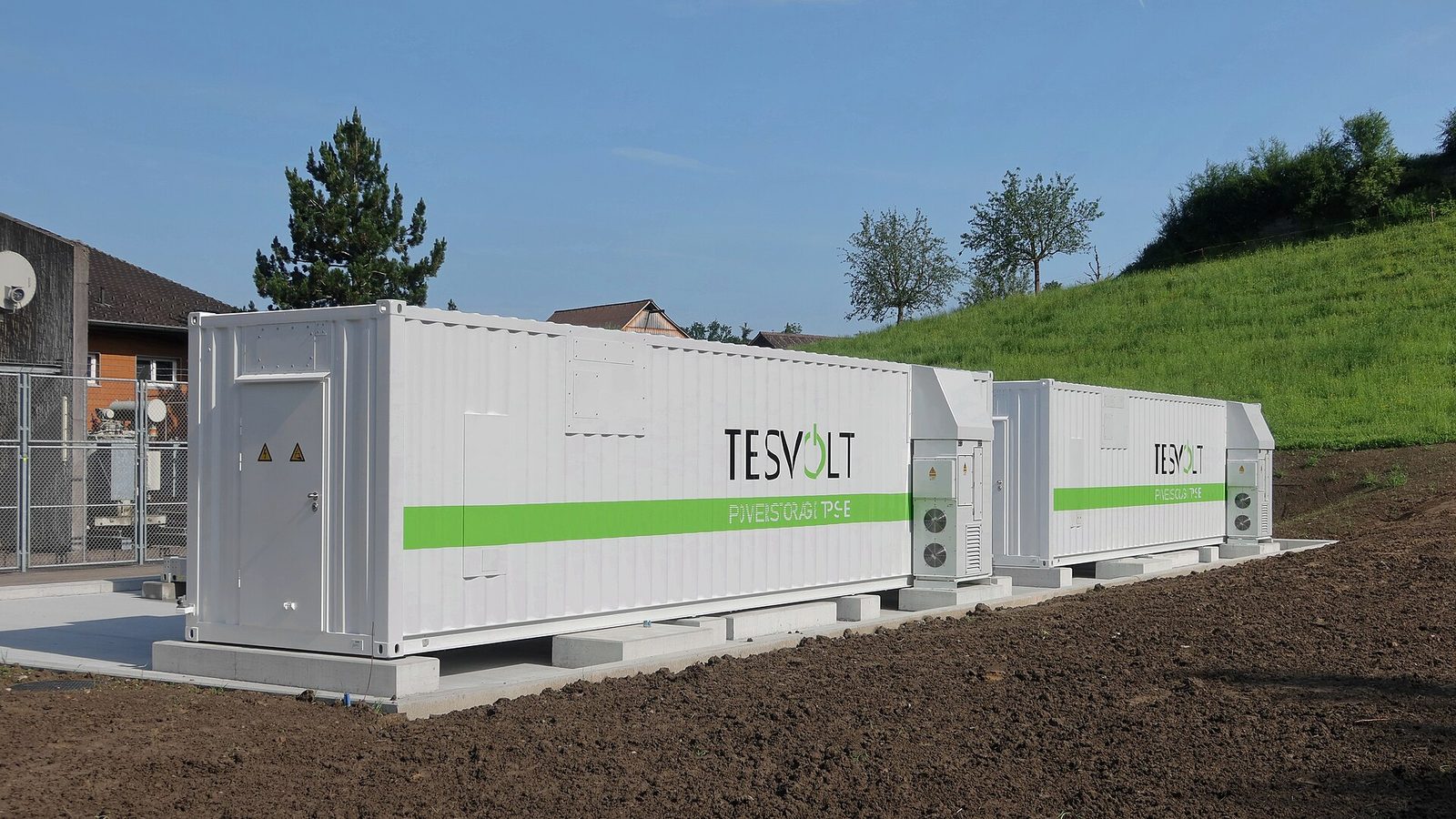 Rows of battery storage units at a power station in Rheineck, Switzerland