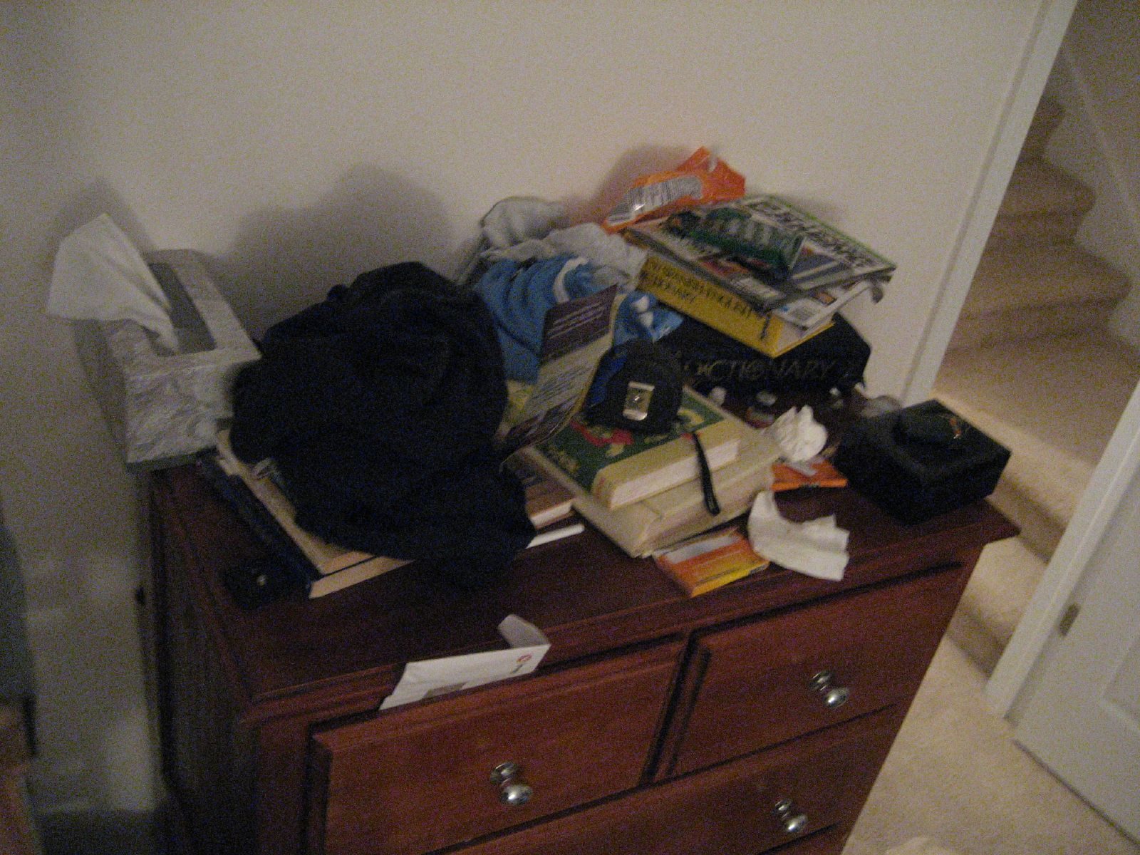 A wooden chest of drawers