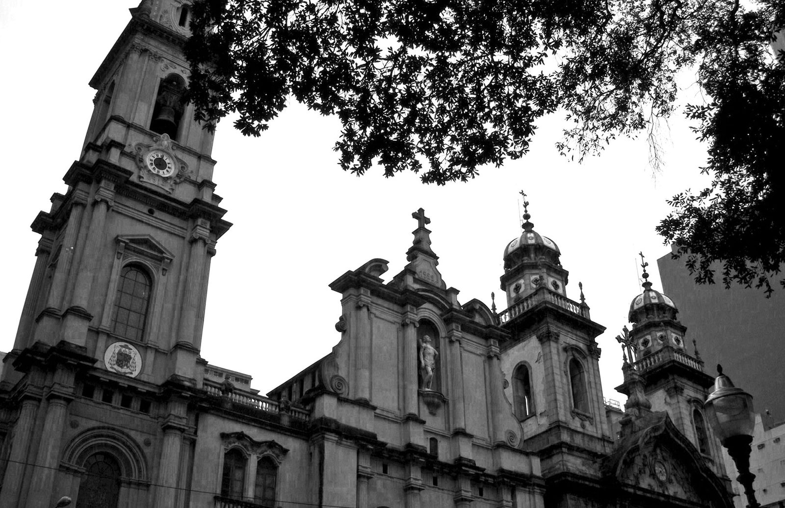 Black-and-white view of the bell tower and facade of the Church of Our Lady of Mount Carmel of the Old Cathedral (Antiga Se) in downtown Rio de Janeiro