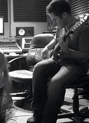 Musician Jon Crowe in a recording studio in 2008