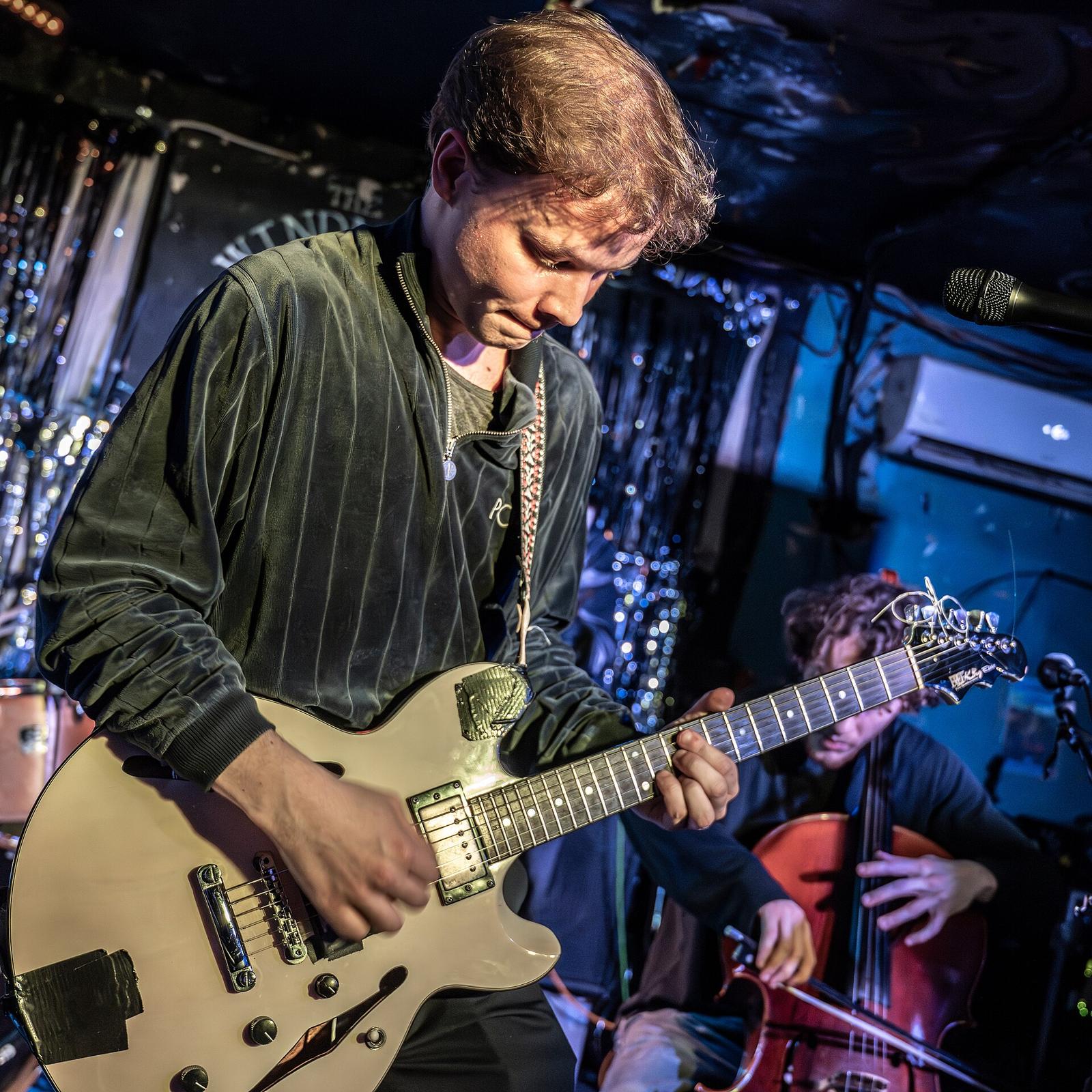 Geordie Greep performing solo material with his band at The Windmill, Brixton. March 2024