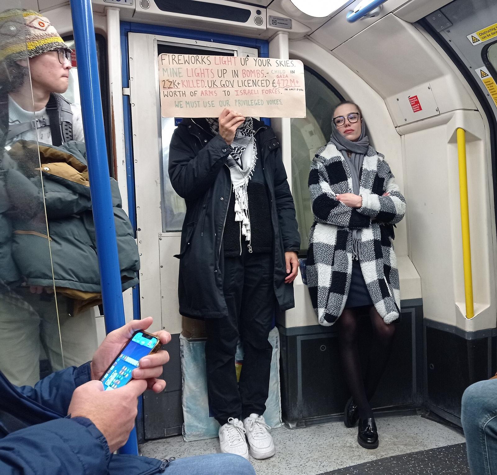 Pro-Palestinian placards on the London Tube