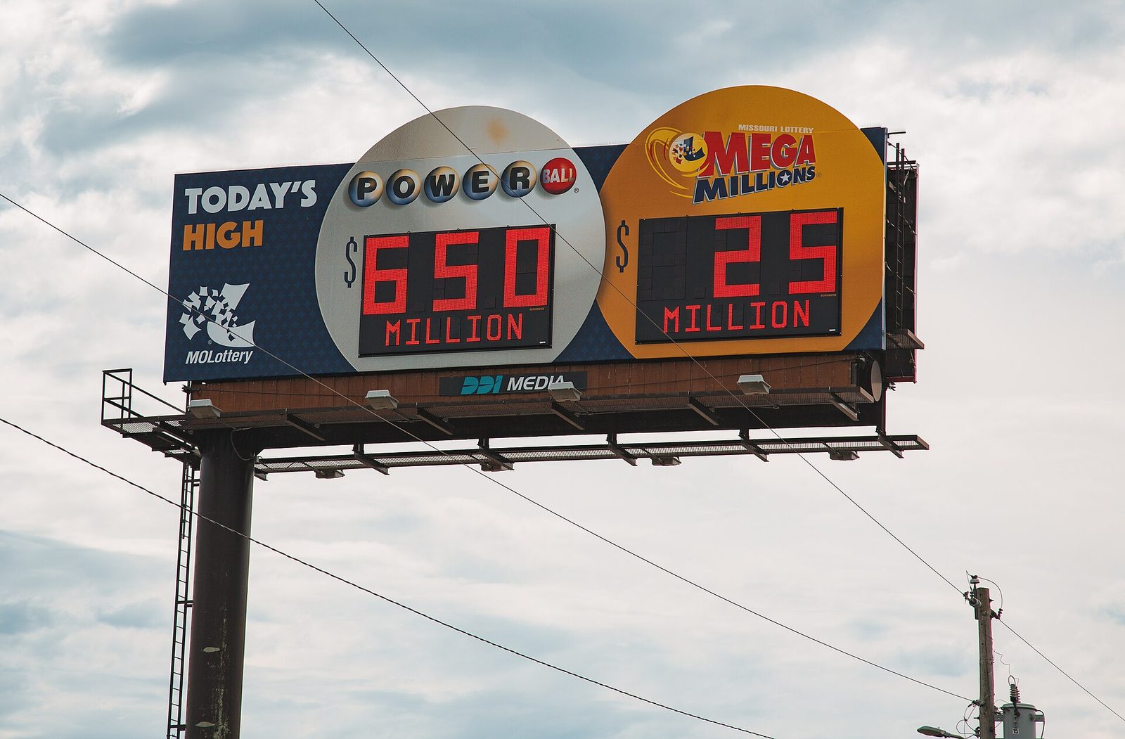 Missouri Lottery roadside billboard showing a $650 million Powerball jackpot and a $25 million Mega Millions jackpot