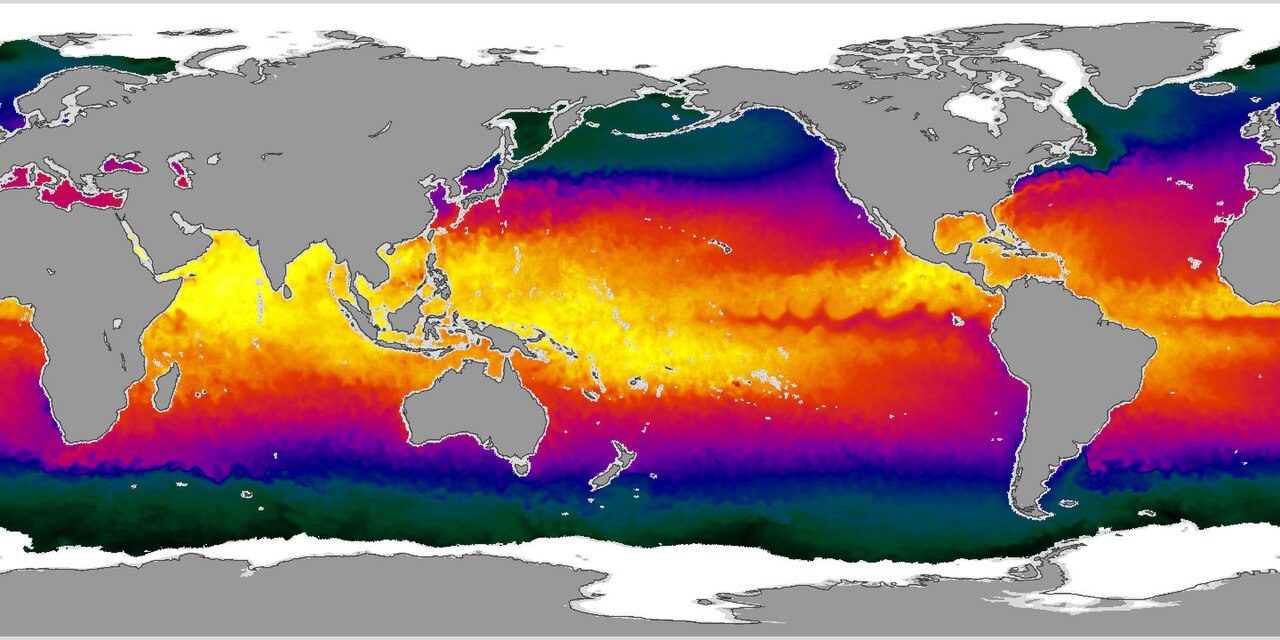 A NASA satellite map of global sea surface temperatures, with warmer water shown in red near the equator