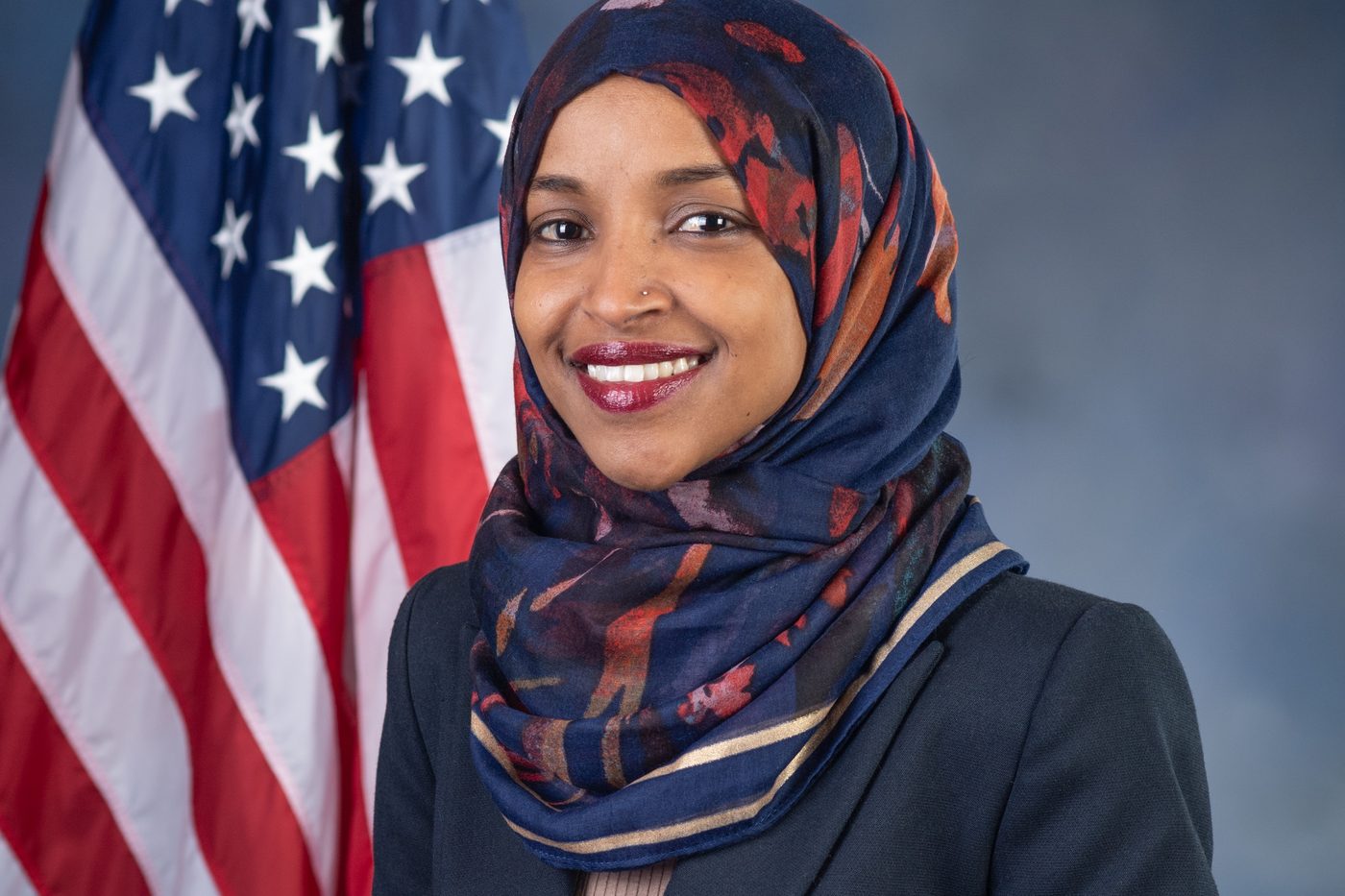 Official 2018 House portrait of Rep. Ilhan Omar, D-Minn., in front of a U.S. flag (file photo)