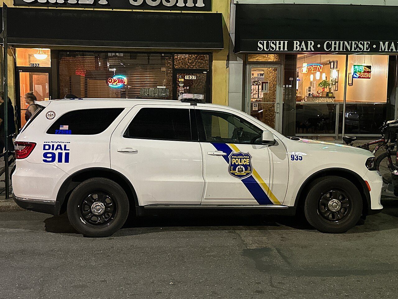 A Philadelphia Police Department SUV parked on a city street