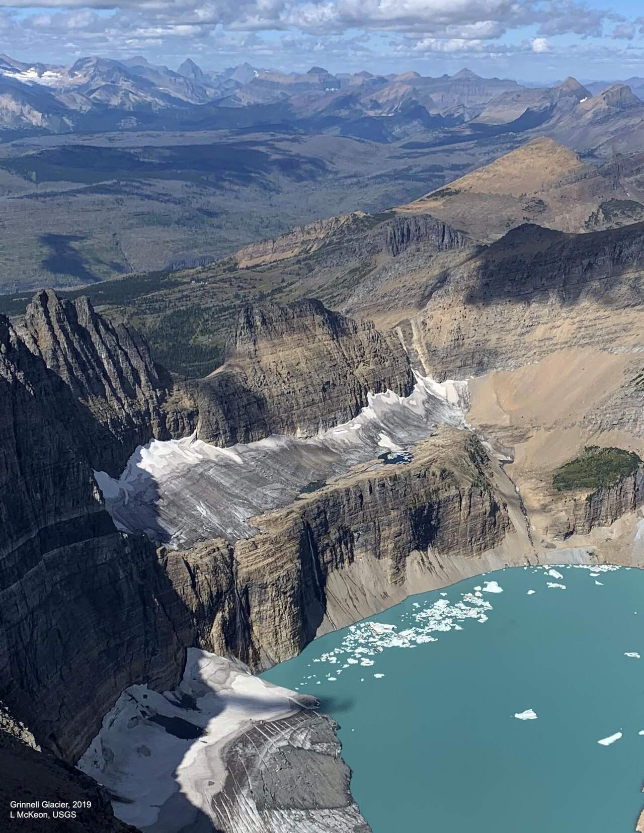 Grinnell Glacier and its meltwater lake in Glacier National Park, Montana