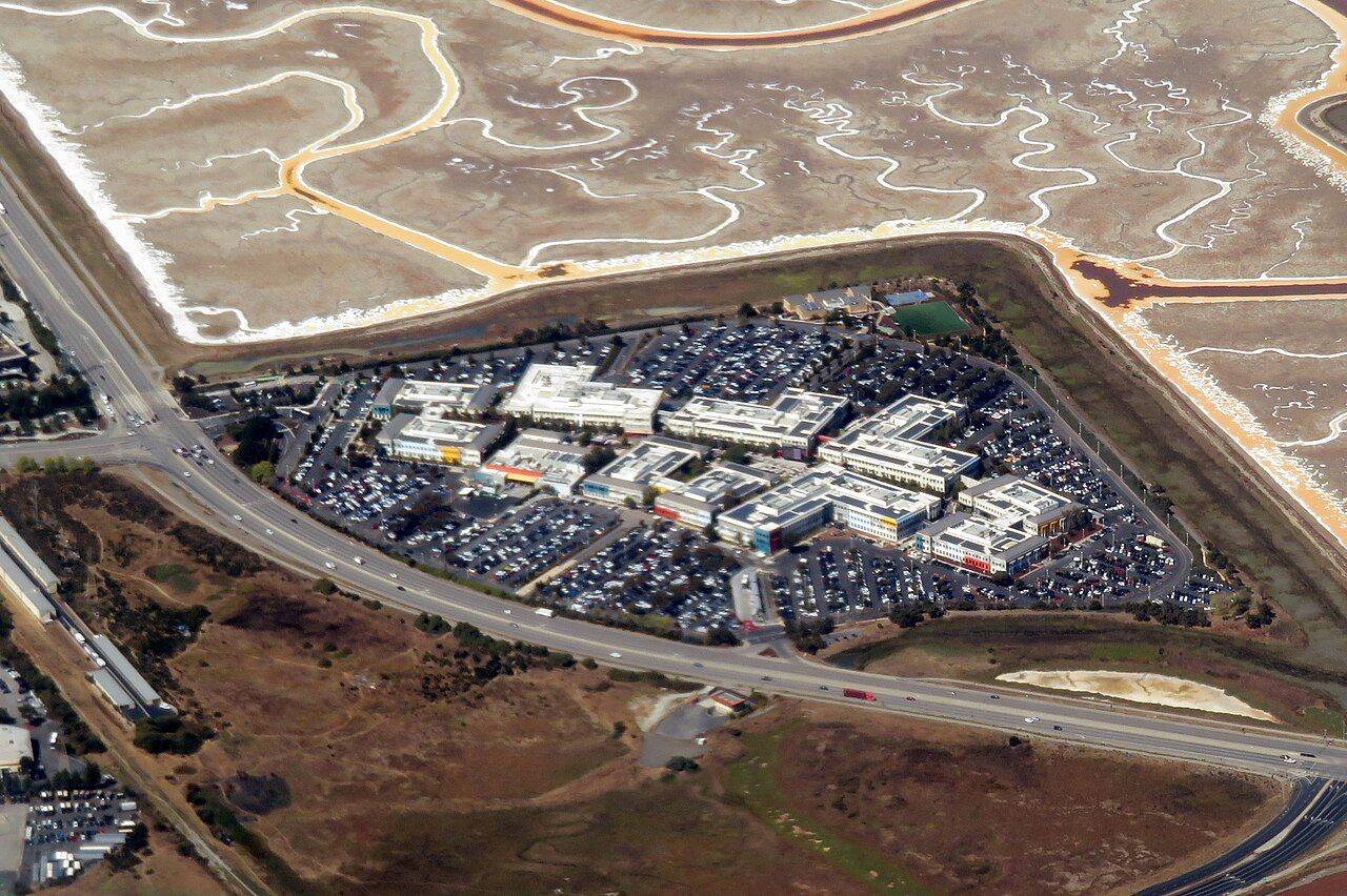 Aerial view of Meta's Menlo Park campus with office buildings and parking