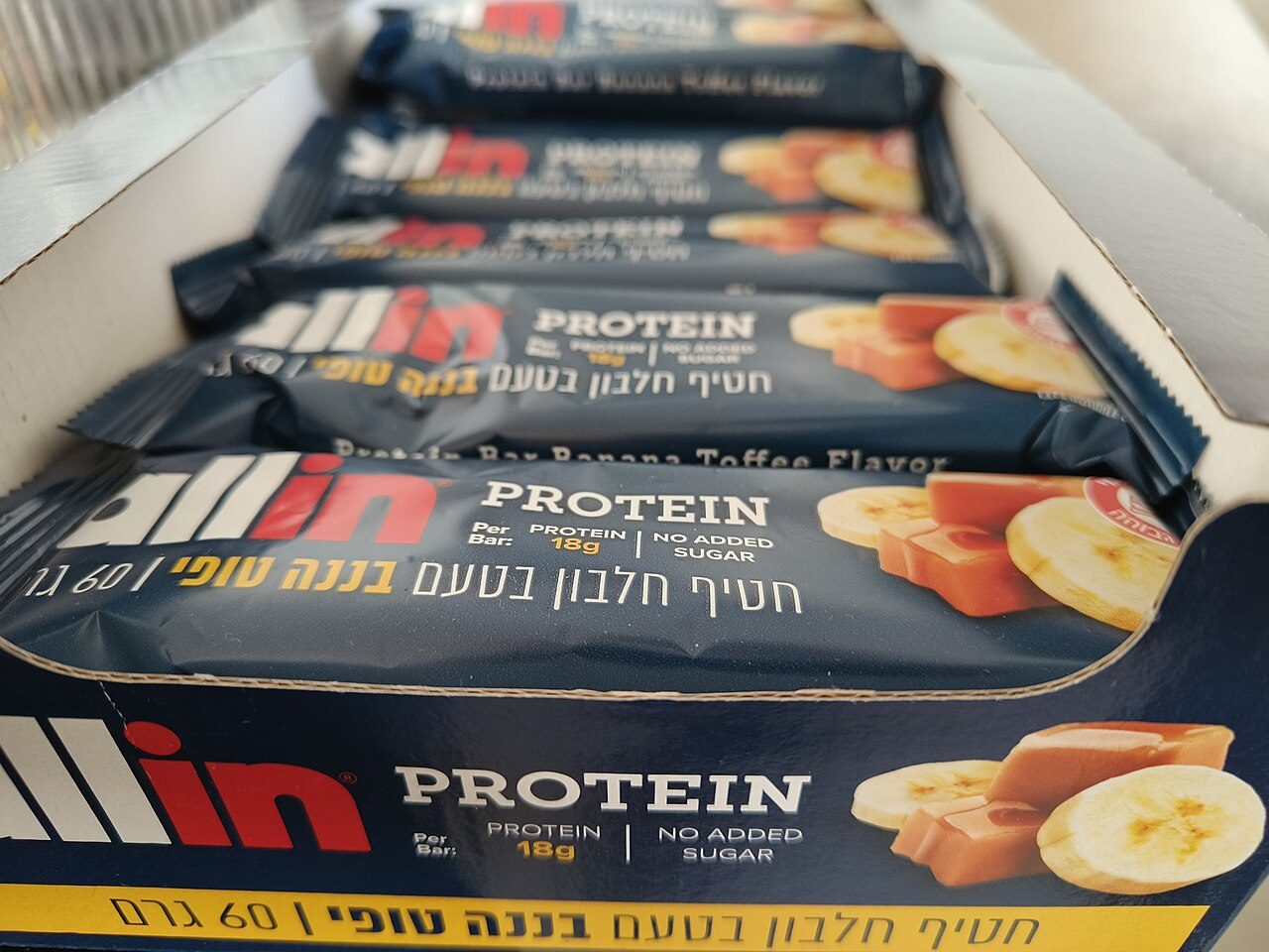 Several protein bars in their packaging