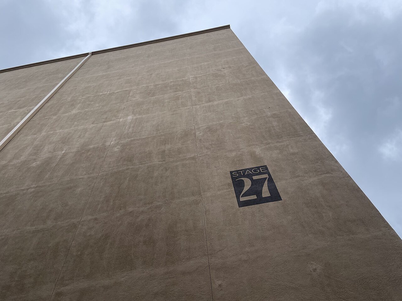The outside wall of a large film soundstage in Culver City