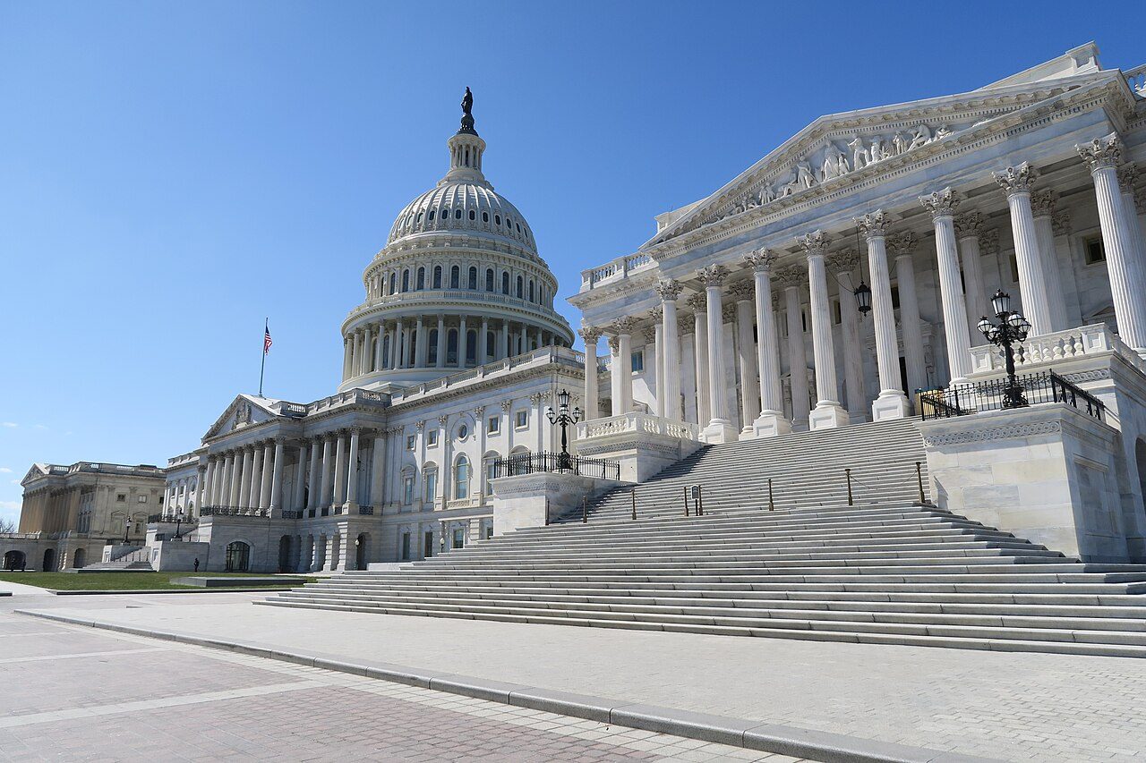 The U.S. Capitol's East Front and dome seen from the northeast, with the Senate wing steps in the foreground