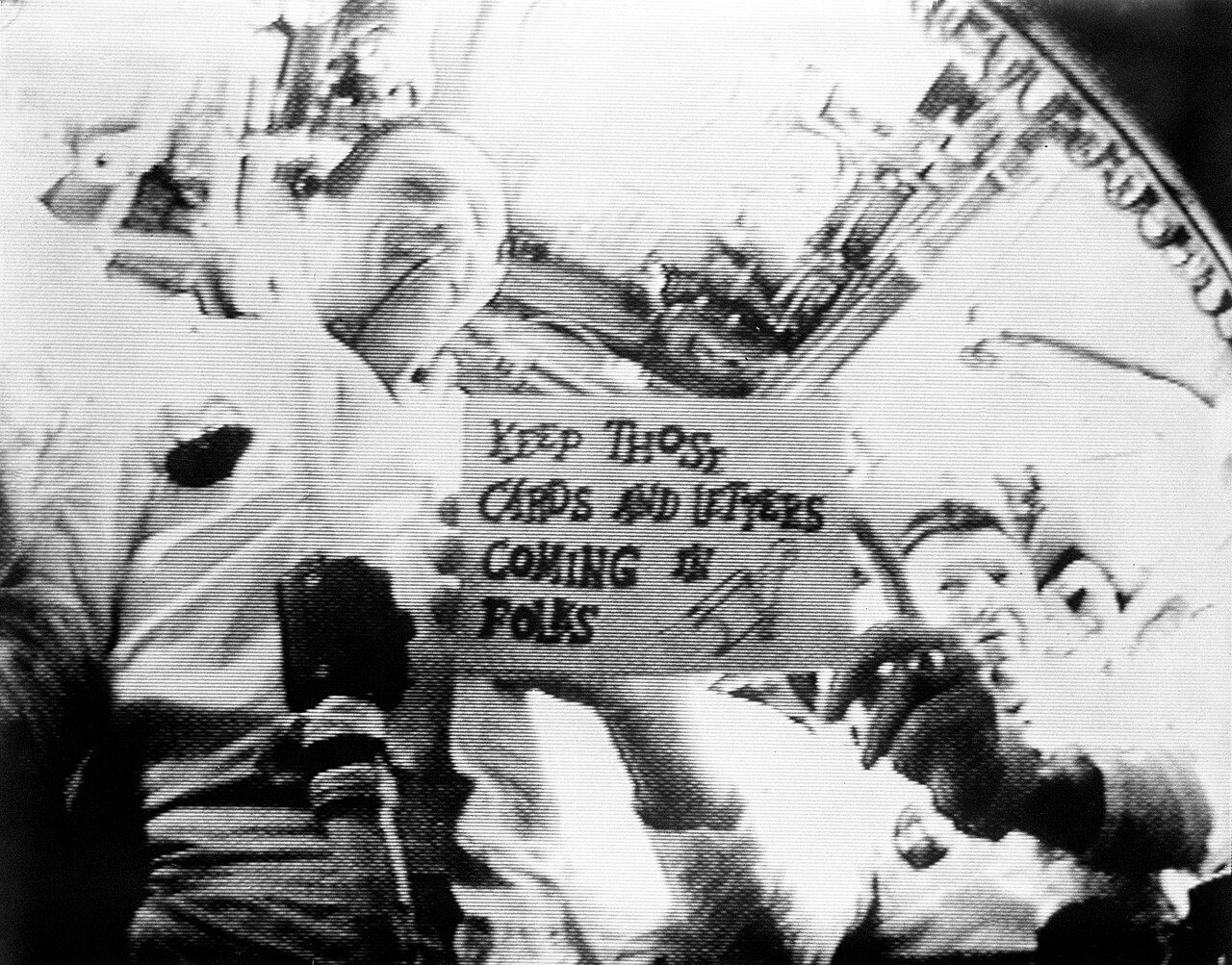 NASA image of Apollo 7 astronauts Wally Schirra and Donn Eisele seen inside their spacecraft during the first live TV transmission.