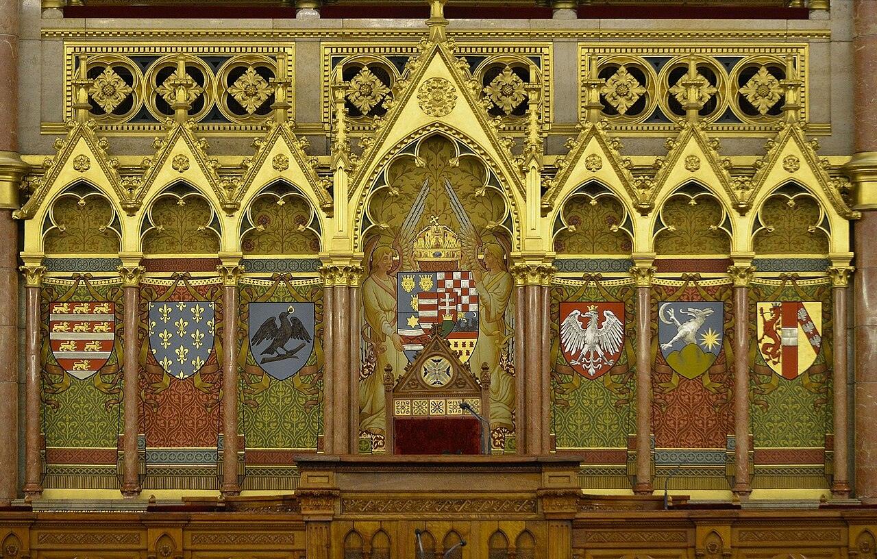 Gilded panel of coats of arms inside the Hungarian Parliament Building in Budapest