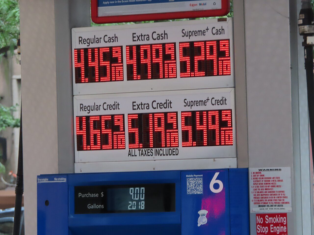 Gas station price sign in New York in 2021 showing regular gasoline at $4.45 a gallon for cash