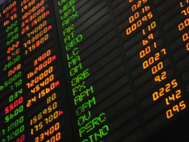 A large electronic board showing Philippine stock prices