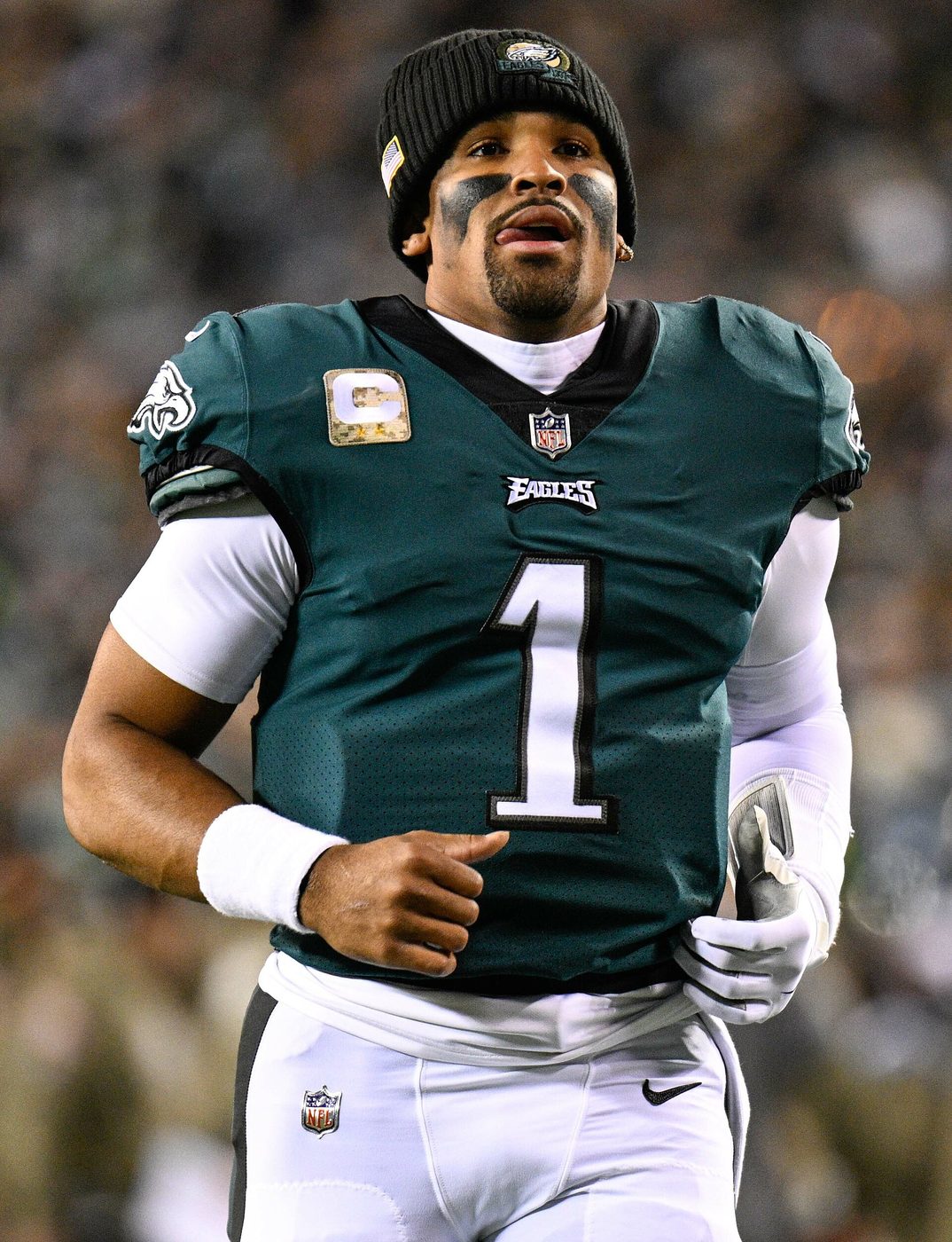 Eagles quarterback Jalen Hurts in a green Philadelphia uniform during a game