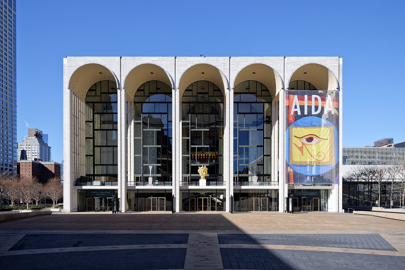 The arched glass front of the Metropolitan Opera House at Lincoln Center