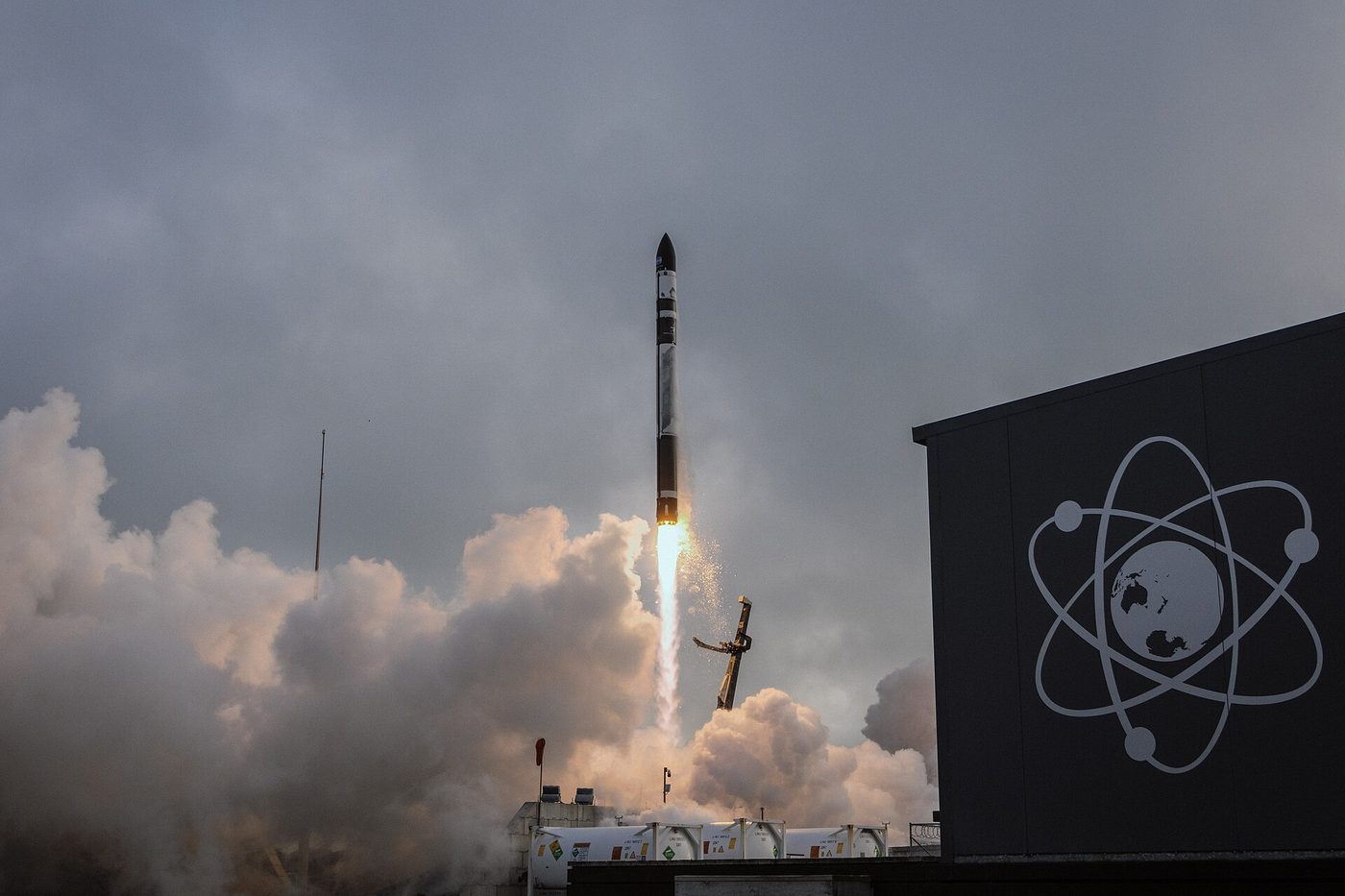 A Rocket Lab Electron rocket lifting off from its pad in New Zealand