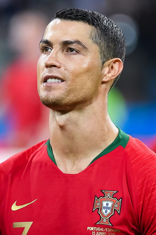 Cristiano Ronaldo in a Portugal jersey on the field during a match