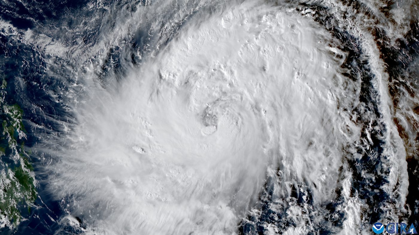 Satellite image of a large typhoon with a clear eye over the western Pacific Ocean