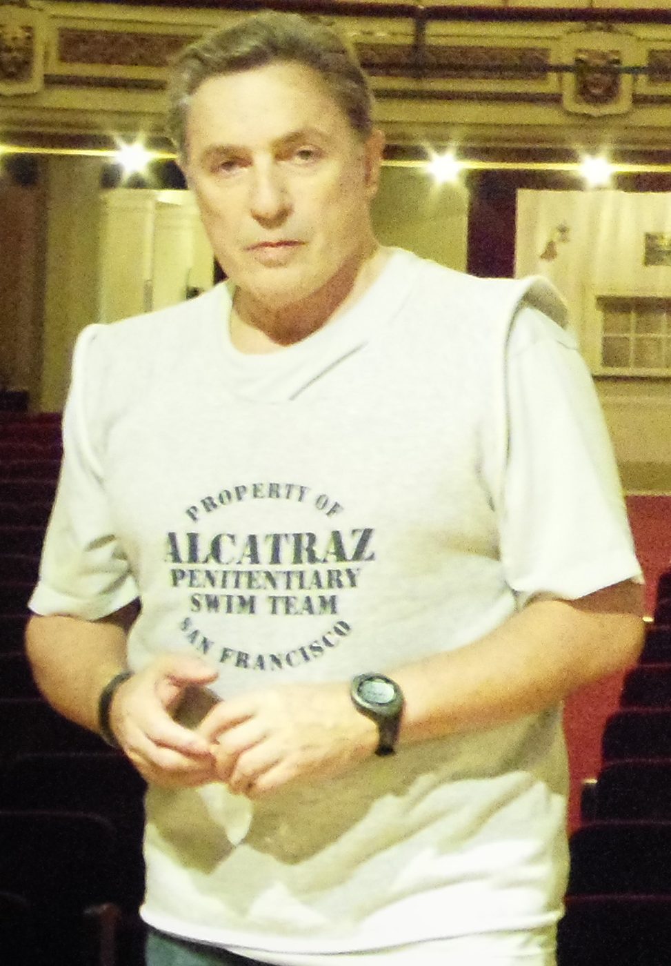 Antonio Grimau smiling at a public event