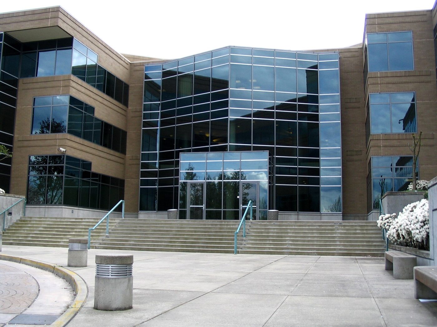 The glass entrance of a Microsoft office building