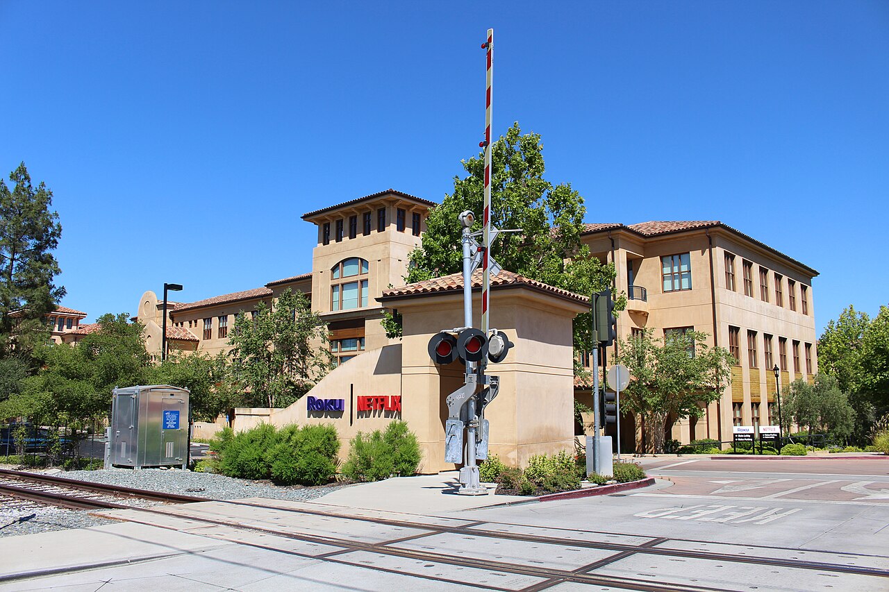 A two-story office building with palm trees in Los Gatos, California